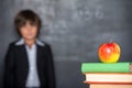 School boy standing near blackboard Royalty Free Stock Photo