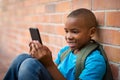School boy using smart phone Royalty Free Stock Photo