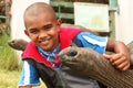 School boy visits the giant tortoises on St Helena
