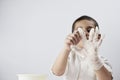 A boy wearing medical gloves Royalty Free Stock Photo