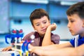 School Boys playing with construction set. Royalty Free Stock Photo