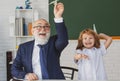 School break with teacher. Pupil with airplanes. Education, teachering, learning. Schoolboy in classroom. Royalty Free Stock Photo