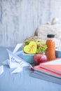 School breakfast with fruits and vegetables on plate