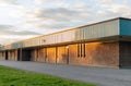 School building and schoolyard in the evening Royalty Free Stock Photo