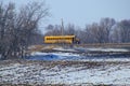 A School Bus on a Country Road Royalty Free Stock Photo