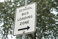 school bus loading zone vertical rectangle sign with arrow pointing right Royalty Free Stock Photo