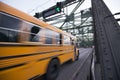 School Bus Is Moving On Bridge With Green Traffic Light