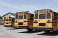 School Bus staging area waiting for students. School buses are an effective transportation method in rural districts