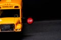 The stop signal arm. The school bus display a stop signal. Royalty Free Stock Photo