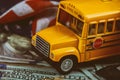 School busses, american dollars cash money and Usa Flag. close up Royalty Free Stock Photo