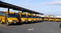 School busses awaiting school openings  to be active again Royalty Free Stock Photo