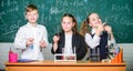 School chemistry lesson. Test tubes with colorful substances. School laboratory. Group school pupils study chemical