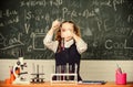 School chemistry lesson. Test tubes with substances. Formal education. Future microbiologist. School laboratory. Girl Royalty Free Stock Photo