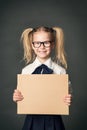 School Child Advertising Board over Blackboard Background, Girl