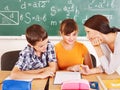 School child with teacher. Royalty Free Stock Photo