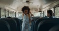 School children boarding schoolbus. Diverse students getting in academic shuttle