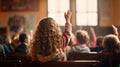 School children in classroom at lesson. Little children raising hands up and having fun in class. Royalty Free Stock Photo
