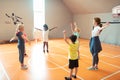 School children exercising during their sports lesson.