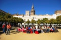 School children and Giralda tower, Seville.