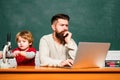 School children. Happy family. Back to school. Concept of education and teaching. Young or adult. Teacher and schoolboy Royalty Free Stock Photo