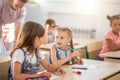 School children are participating actively in class. Education, homework concept Royalty Free Stock Photo