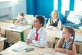 School children participating actively in class. Education, learning, high school Royalty Free Stock Photo