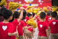 School children raising hands up on celebration day