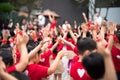 School children raising hands up