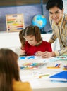 School children and teacher in art class Royalty Free Stock Photo