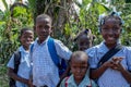 Uniformed school children are delighted and puzzled by camera of medical missionary to Haiti. Royalty Free Stock Photo