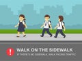 School children walking on the sidewalk. Pedestrian safety rule.