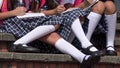 School Children Wearing Skirts And White Socks