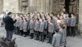 School choir singing Christmas carols in front of Bath Abbey A Royalty Free Stock Photo