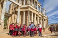 School class dressed in uniform in the historic roman theater of Merida
