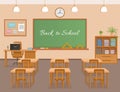 School classroom with chalkboard, student desks and teachers workplace. School class room interior design