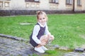 School concept. Back to school. A little girl holds a magnifying glass magnifier in her hands and examines insects. Botany. biol