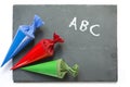 School cones on a chartboard with message good luck Royalty Free Stock Photo