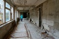 School corridor, dead abandoned ghost town Pripyat in exclusion zone of Chernobyl NPP, Ukraine Royalty Free Stock Photo