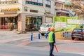 School crossing guard at corner Royalty Free Stock Photo