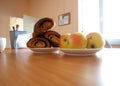 School dining room, lunch for students, school apple, school milk and cinnamon bun, school feeding