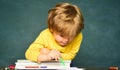 School and education concept. Schoolkid or preschooler learn. School or college pupil showing parents a test with good