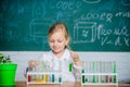 School education. Interesting approach to learn. Future scientist. Explore and investigate. School lesson. Girl cute Royalty Free Stock Photo
