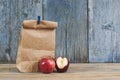 brown paper bag on wooden background Royalty Free Stock Photo