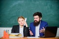 School educator and schoolmaster different opinion. School staff. School collective and relations between colleagues Royalty Free Stock Photo