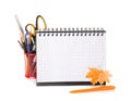 School equipment with pencils, notebook and dry autumn leaves. Royalty Free Stock Photo