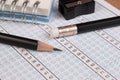 School exam answer sheet and pencil. Royalty Free Stock Photo