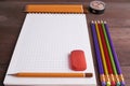 School exercise book with colorful pencils Royalty Free Stock Photo