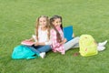 School friends girls study outdoors, informal education concept