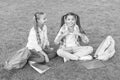 School friends girls study outdoors, open air classes concept