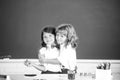 School friends hugging. Two school kids, girl and boy holding hands going at school class in classroom. Two primary Royalty Free Stock Photo